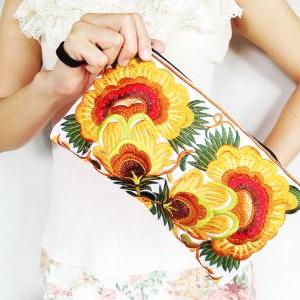 Colorful Gold Cotton Embroidered Purse On White..