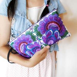 Colorful Purple Cotton Embroidered Purse On White..